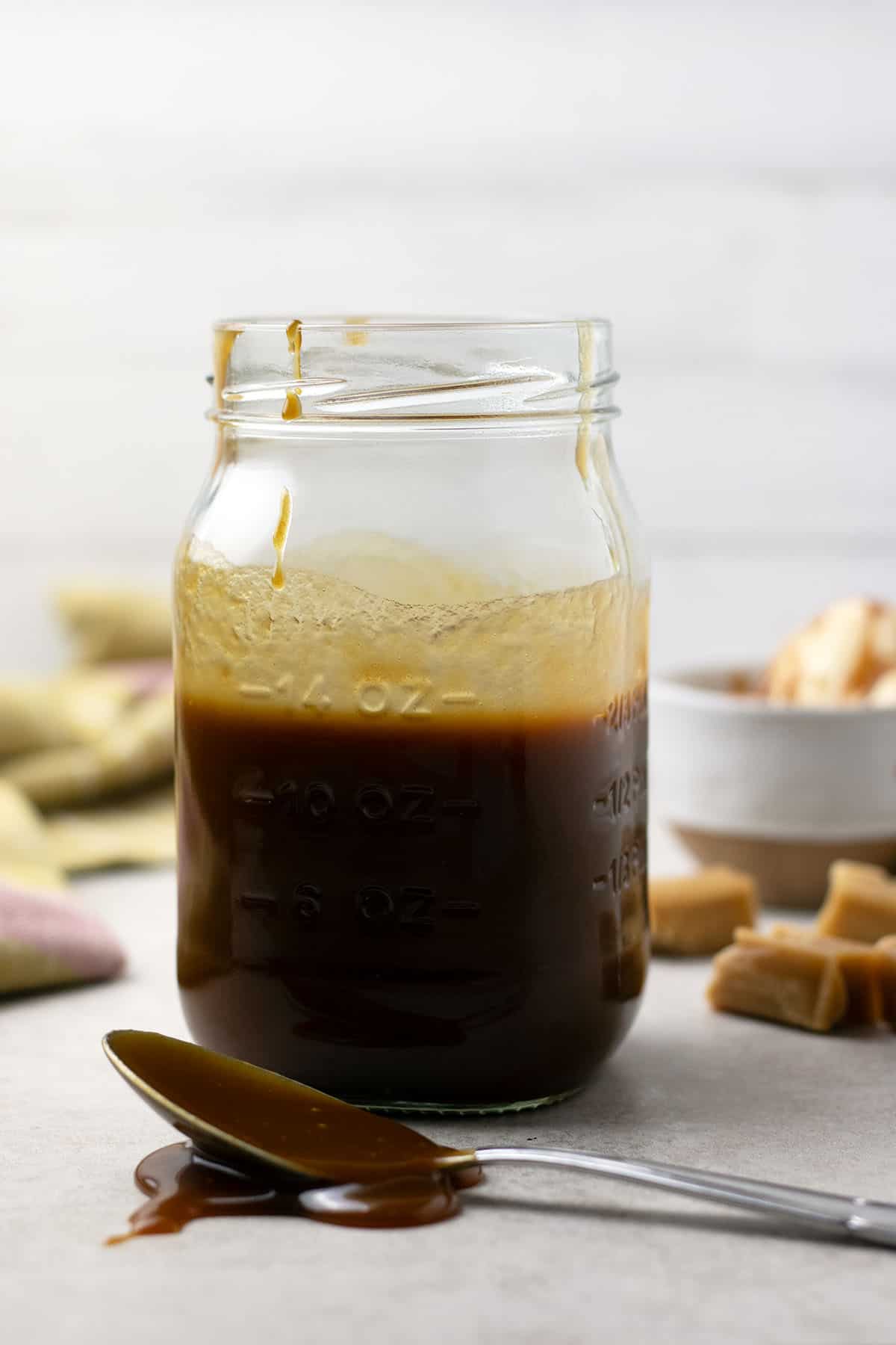 homemade caramel sauce in a jar